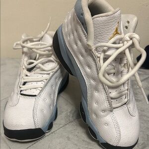 Jordans White and Blue Sneakers with Gold Logo